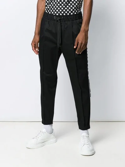 Shop Dolce & Gabbana Logo Stripe Track Trousers In Black