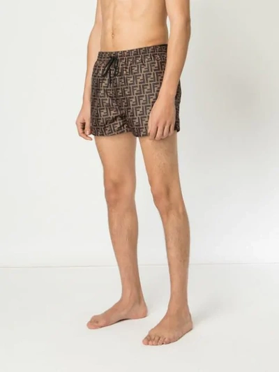 Fendi Tech Fabric With All-over Ff Pattern Swim Shorts In Brown