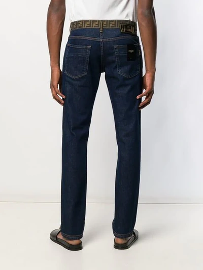 Shop Fendi Ff Waistband Jeans In Blue