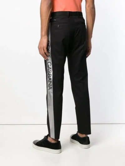 Shop Dolce & Gabbana Logo Tape Trousers In Black