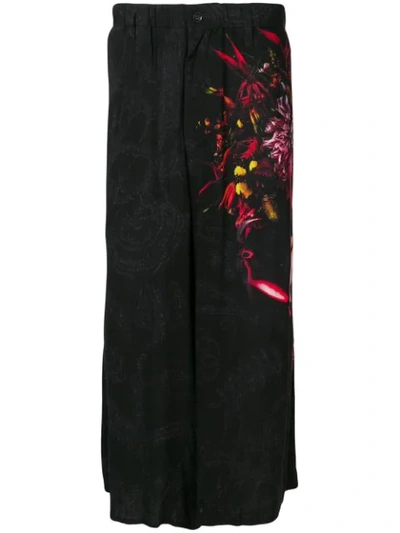 Shop Yohji Yamamoto Graphic Print Flared Trousers In Black