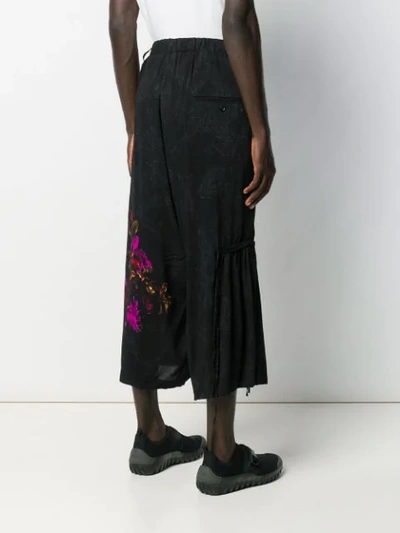 Shop Yohji Yamamoto Graphic Print Flared Trousers In Black