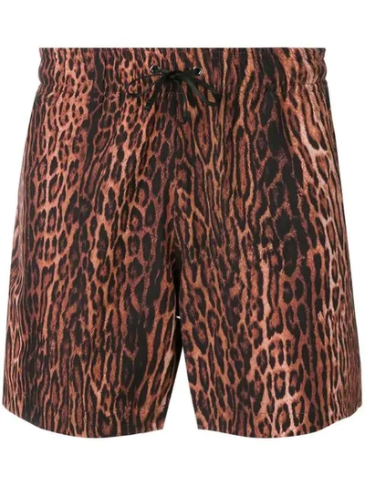 Shop Amiri Leopard Swim Shorts In Brown