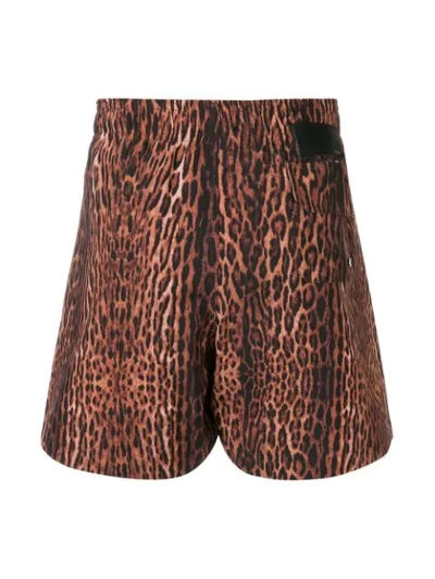 Shop Amiri Leopard Swim Shorts In Brown