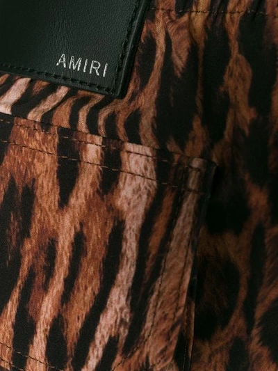 Shop Amiri Leopard Swim Shorts In Brown