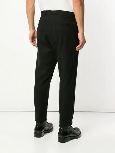 Shop Ann Demeulemeester Tailored Tapered Trousers In Black