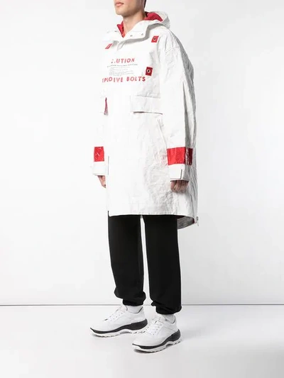 Shop Undercover Explosive Bolts Hooded Parka In White
