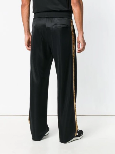 Shop Versace Baroque Print Track Pants In Black