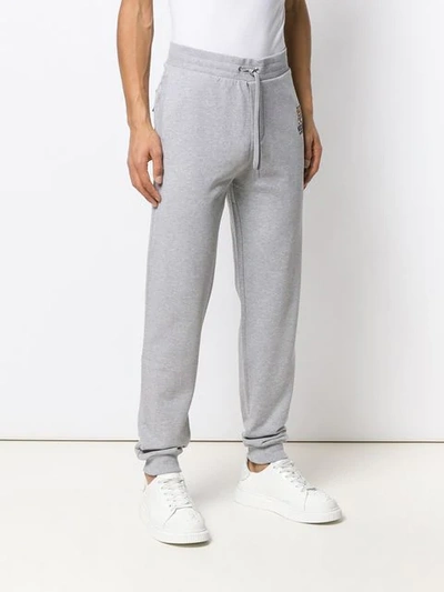 Shop Moschino Logo Track Pants In Grey