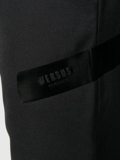 Shop Versus Regular Tapered Trousers In Black