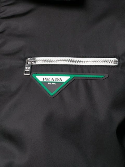 Shop Prada Logo Patch Zipped Jacket In F0002 Nero