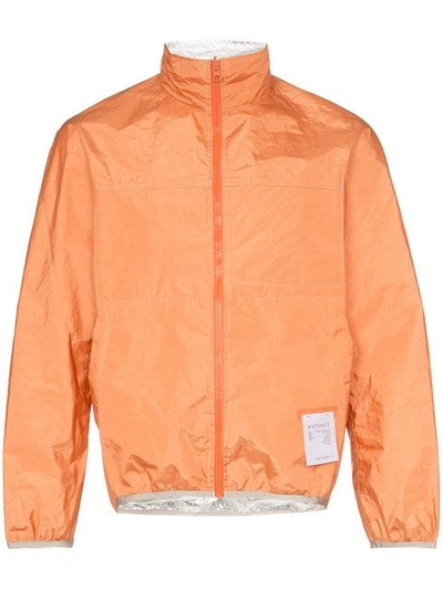 Shop Satisfy Reversible Windbreaker Jacket In Orange