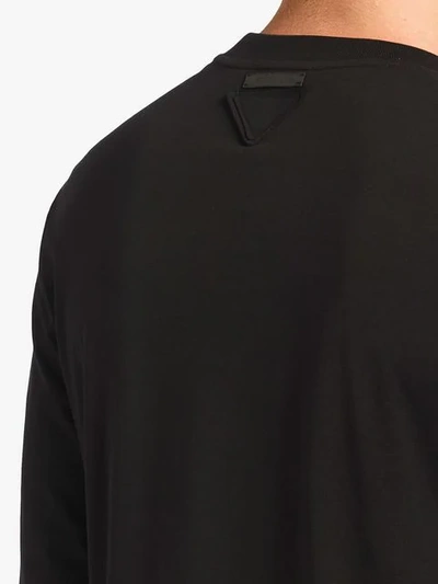 Shop Prada Long-sleeved Jersey T-shirt In Black