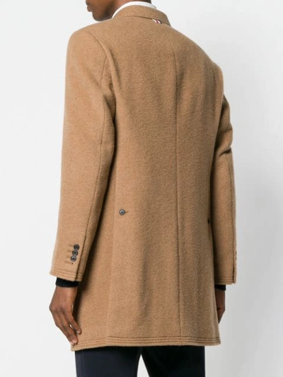 buttoned up longsleeved coat