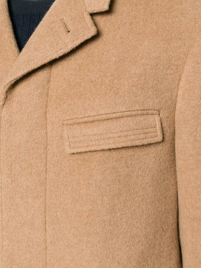 buttoned up longsleeved coat