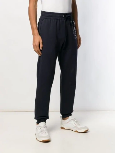 Shop Moschino Double Question Mark Logo Track Pants In Blue