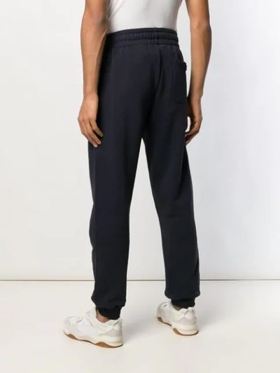 Shop Moschino Double Question Mark Logo Track Pants In Blue