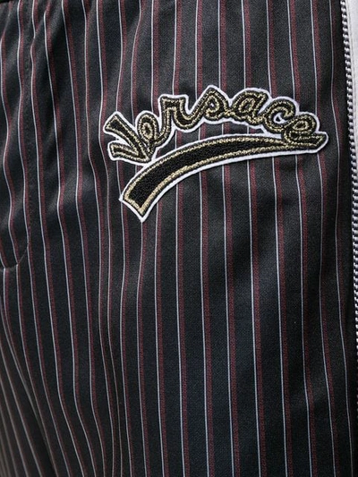 Shop Versace Team Logo Pinstripe Track Pants In Black