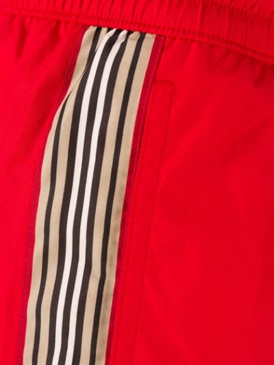 Shop Burberry Icon Stripe Swim Shorts In Red