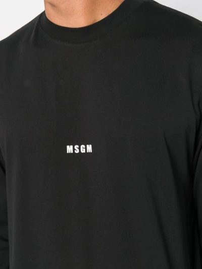 Shop Msgm Longsleeved Logo T-shirt In Black