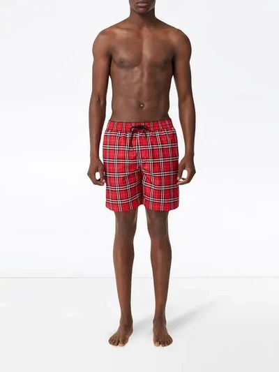 Shop Burberry Check Drawcord Swim Shorts In Cadmium Red Ip Check