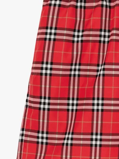 Shop Burberry Check Drawcord Swim Shorts In Cadmium Red Ip Check