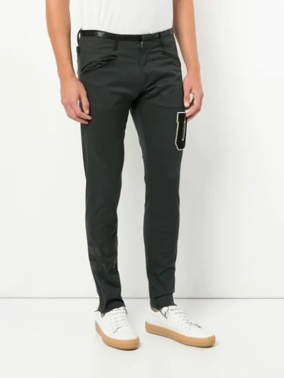 Shop Undercover Letter Patch Skinny Trousers - Black