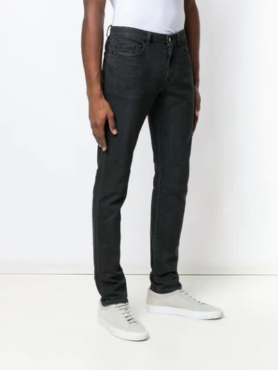 Shop Saint Laurent Classic Skinny Jeans In 1097 Black