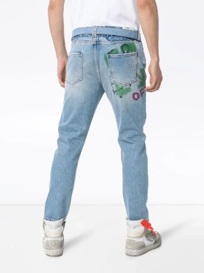 Shop Off-white Spray Paint Logo Jeans In Blue