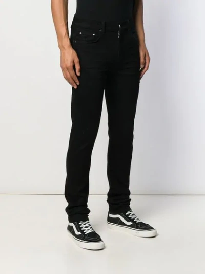 Shop Amiri Slim-fit Jeans In Black