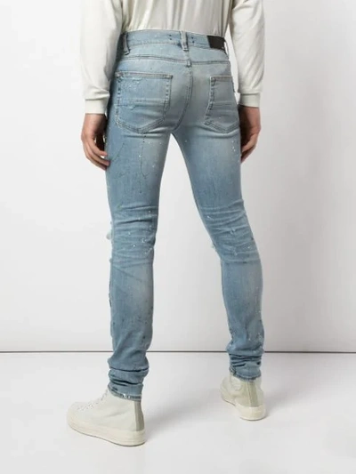 Shop Amiri Art Patch Slim-fit Jeans In Blue