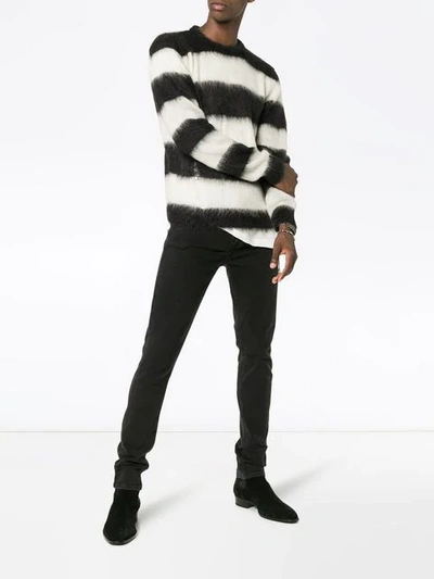 Shop Saint Laurent Striped Long Sleeved Sweater In Black