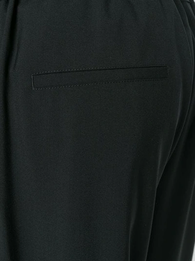 Shop Oamc Elastic Waist Cropped Trousers In 001 Black
