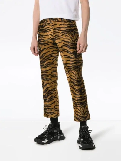 Shop Ashley Williams Tiger Print Faux Fur Executive Trousers In Black