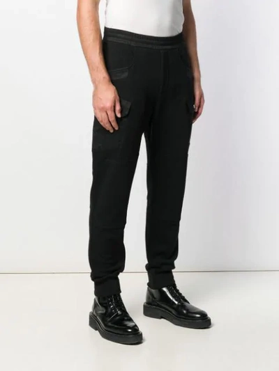 Shop Alexander Mcqueen Relaxed Jogging Trousers In Black