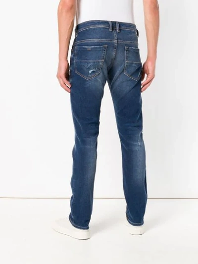Shop Diesel Distressed Fitted Jeans In Blue