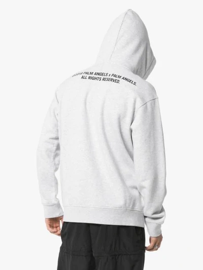 Shop Palm Angels Palm Print Graphic Hoodie In Grey