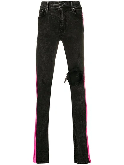 Shop Amiri Stripe Skinny Jeans - Black