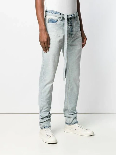 Shop Fear Of God Belted Slim Fit Jeans In Blue