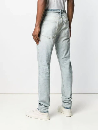 Shop Fear Of God Belted Slim Fit Jeans In Blue