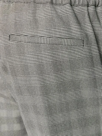 Shop Versace Drawstring Plaid Trousers In Black