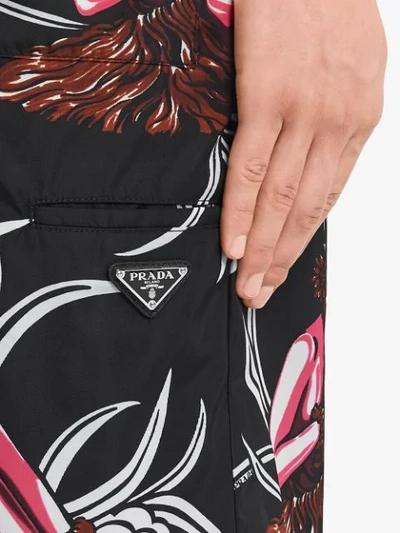 Shop Prada Hawaii Print Swim Shorts In Black