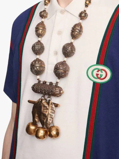 GUCCI POLO WITH INTERLOCKING G PATCH - 蓝色