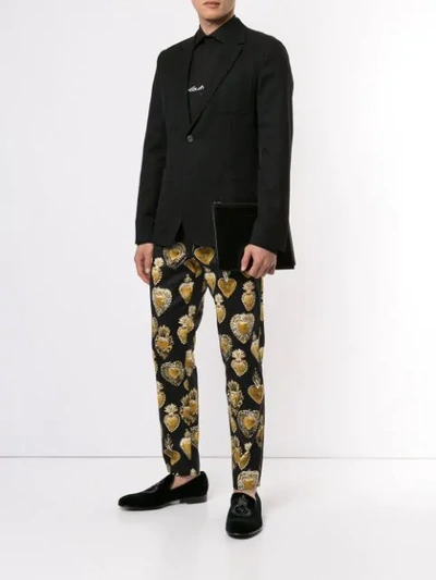 Shop Dolce & Gabbana Sacred Heart Print Trousers In Black