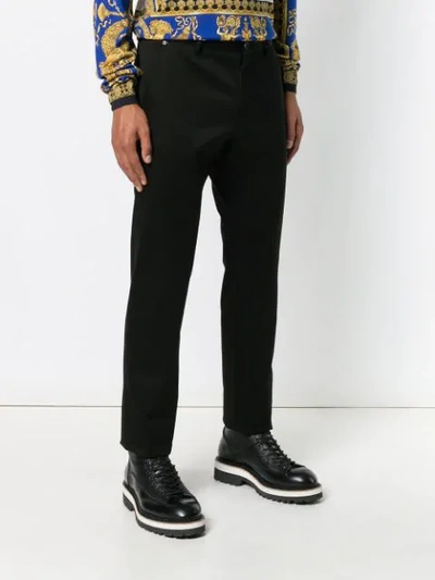 Shop Versace Tailored Slim Trousers In Black