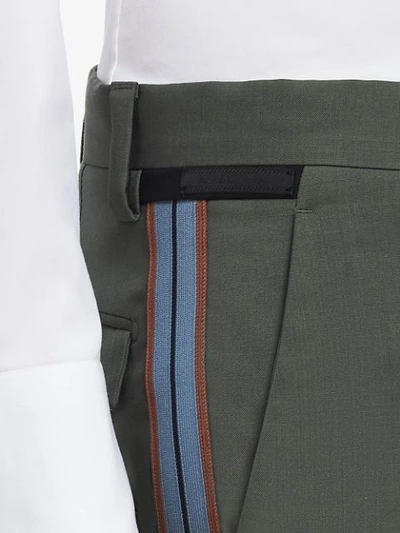 Shop Prada Side Stripe Tailored Trousers In Green