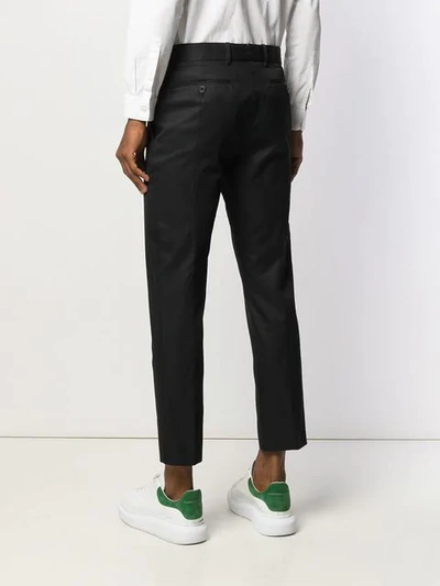 Shop Alexander Mcqueen Zip Front Trousers In Black