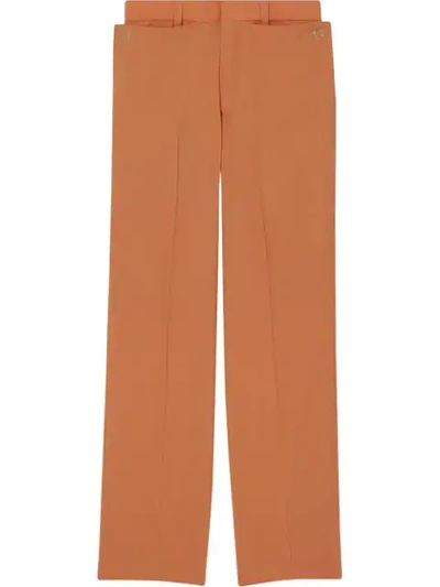 Shop Burberry Buttoned Wide-leg Trousers In Orange