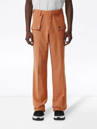 Shop Burberry Buttoned Wide-leg Trousers In Orange