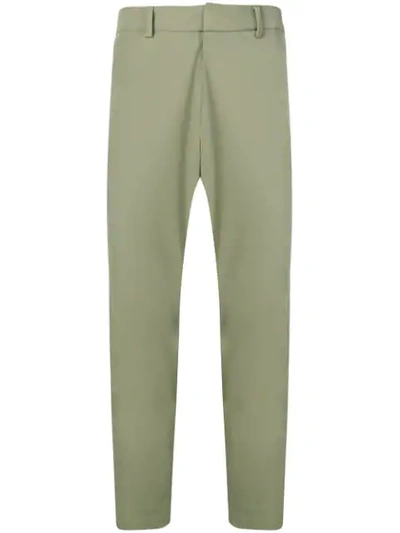 Shop Prada Technical Fabric Trousers In Green